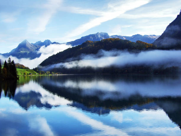 istock Alpine lake Klontalersee in Klontal valley and mountain range Glarus Alps 1126399425