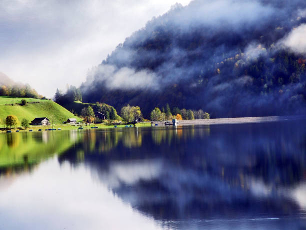 istock Alpine lake Klontalersee in Klontal valley and mountain range Glarus Alps 1126399459
