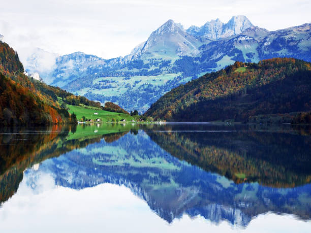 istock Alpine lake Klontalersee in Klontal valley and mountain range Glarus Alps 1126399493