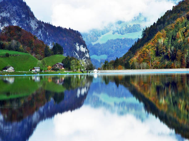 istock Alpine lake Klontalersee in Klontal valley and mountain range Glarus Alps 1126399539