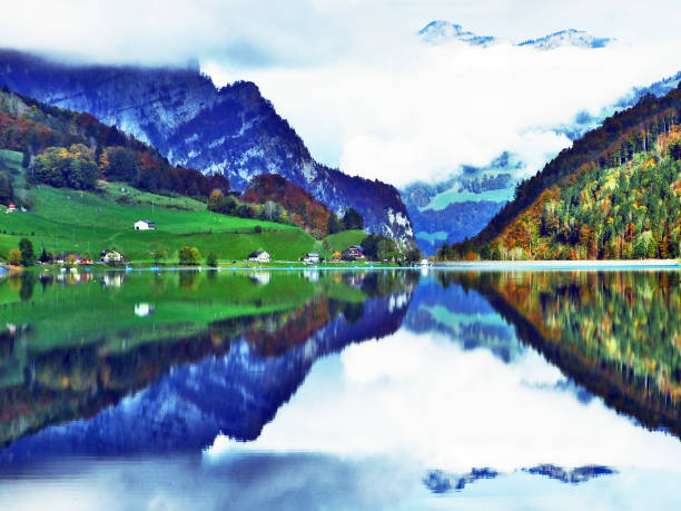 Alpine lake Klontalersee in Klontal valley and mountain range Glarus Alps