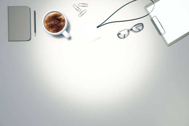 istock Office desktop with coffee and supplies 1126399856