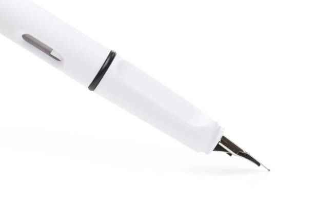istock white modern fountain pen isolated on white, close up 1126399954