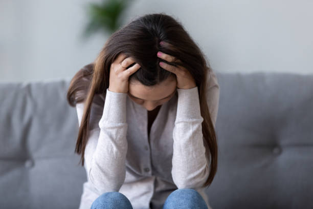 istock Upset young woman feeling hurt depressed lonely suffering from headache 1126400361