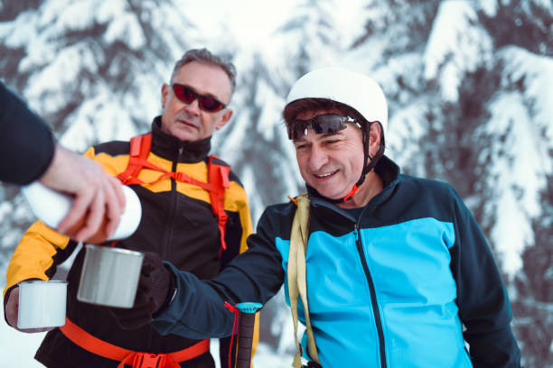istock Senior Alpinist Waiting For a Hot Tea During The Hiking Break 1126400664