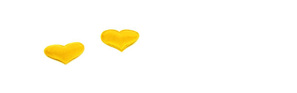 istock Yellow heart on an isolated white background as a panorama, space for text. 1126401200