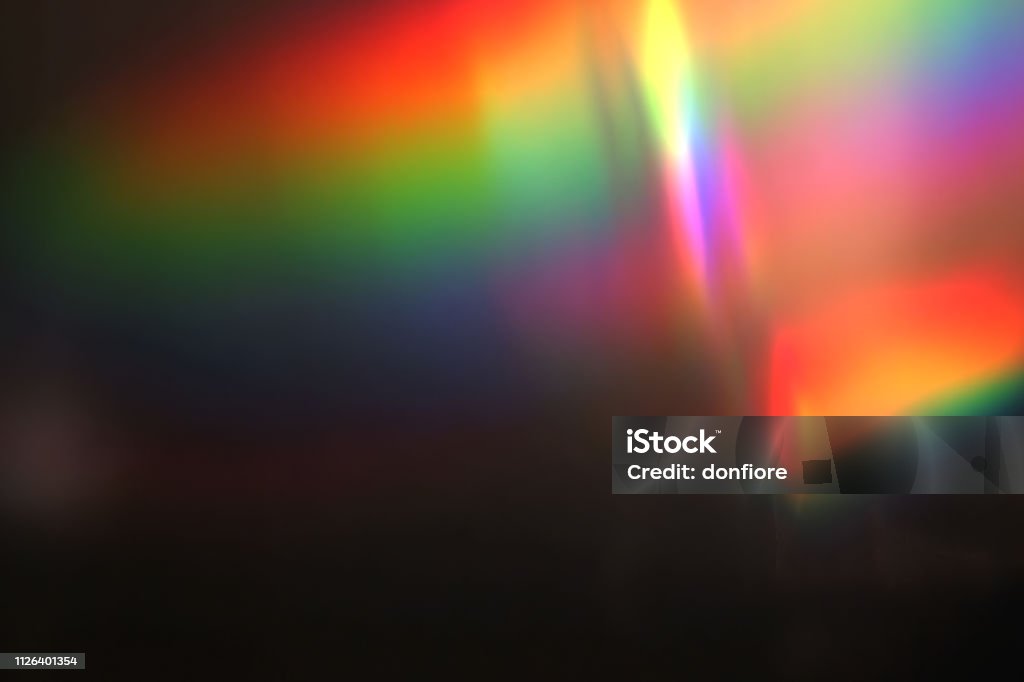 abstract multicolore luce pulsa e brilla perdite bokeh sfondo movimento, con defocus bokeh - Foto stock royalty-free di Attrezzatura per illuminazione