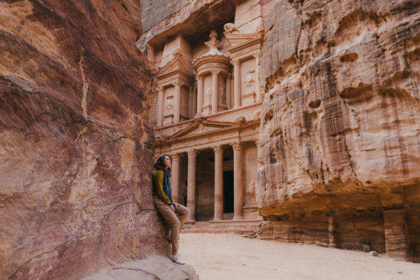 istock Woman looking at Al-Khazneh in Petra 1126404103