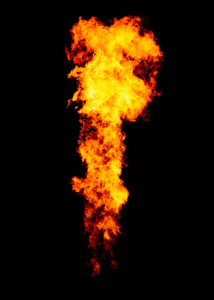 istock Bright flame pillar, powerful jet goes from flamethrower, isolated on black 1126406095