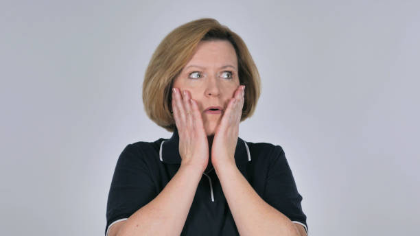 istock Old Woman Confused and Scared of Problems 1126410060
