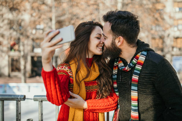 istock Couple getting ready to ice skate 1126410578