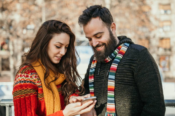 istock Couple getting ready to ice skate 1126411181