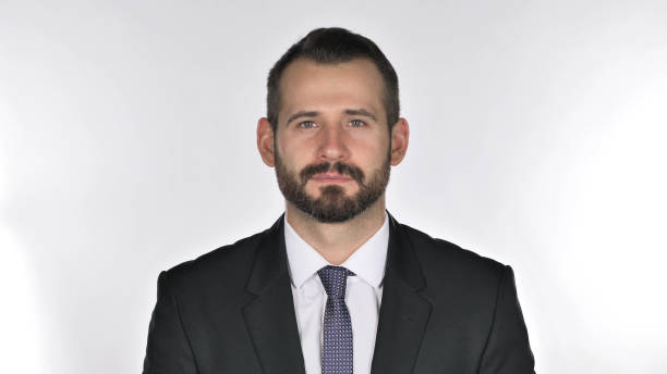 istock Serious Beard Businessman Looking at Camera, White Background 1126411275