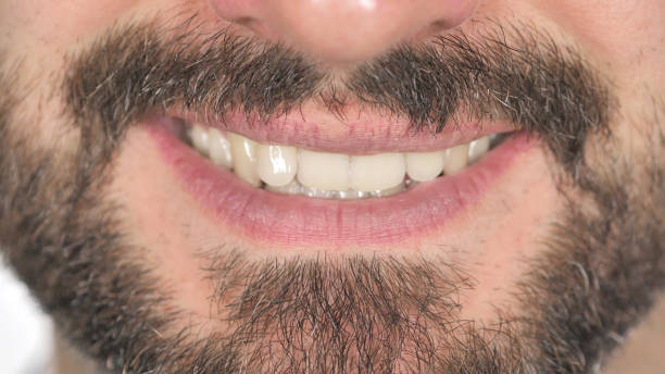 istock Close Up of Smiling Lips of Beard Man, White Background 1126411633