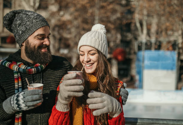 istock Couple getting ready to ice skate 1126411767