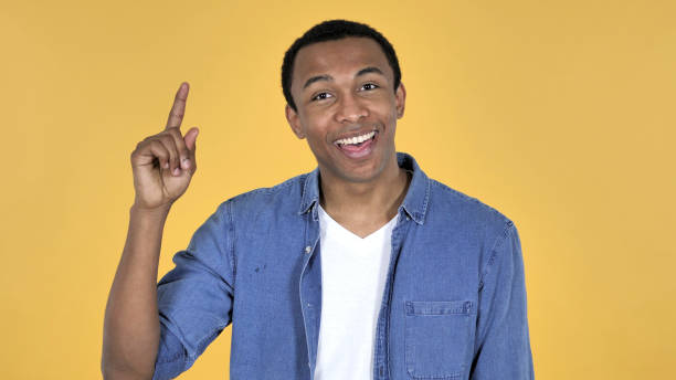 istock Thinking Young African Man Got New Idea Isolated on Yellow Background 1126412366
