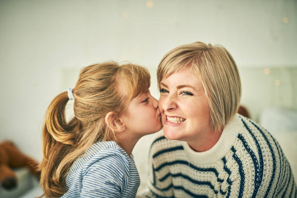 istock I've got a big kissy for you, Mom 1126412398