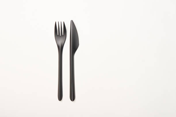 istock Top view of fork and knife isolated on white 1126412619