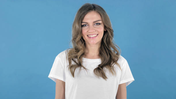 istock Happy Young Girl on Blue Background 1126412713