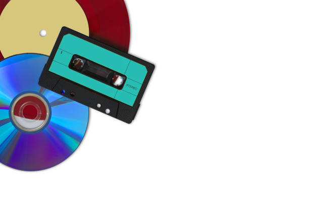 CD, red vinyl record and audio cassette on a white background
