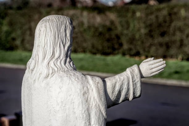 istock Preacher Jesus blessing the dead white statue 1126418169