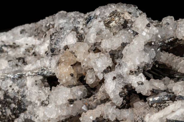 istock Macro mineral stone Stibnite quartz on a black background 1126420305