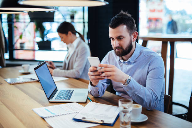 istock Businessman using mobile phone in the office 1126421590