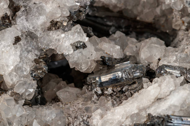 istock Macro mineral stone Stibnite quartz on a black background 1126421775