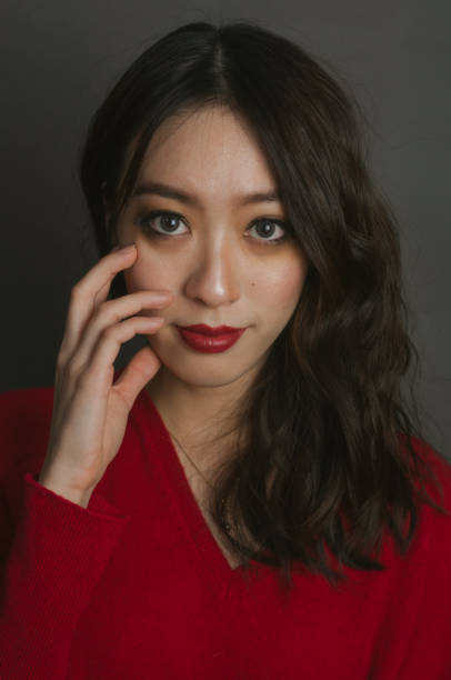 istock red lips Asian woman 1126421829