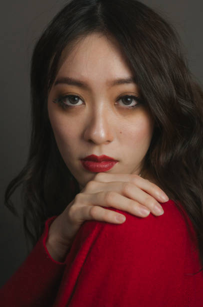 istock red lips Asian woman 1126421948