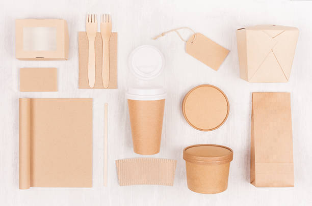 istock Fast food template for branding identity - blank kraft paper notebook, coffee cup, label, card, box for noodles, sushi, soup  on white wood board. 1126422190