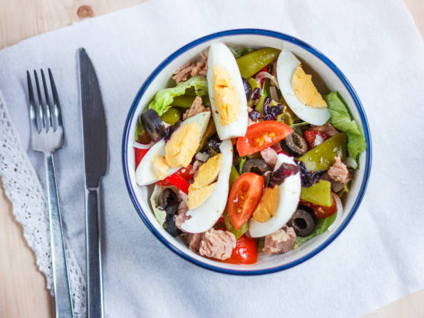 istock Nicoise salad with tuna, green beans, basil and fresh vegetables 1126424791