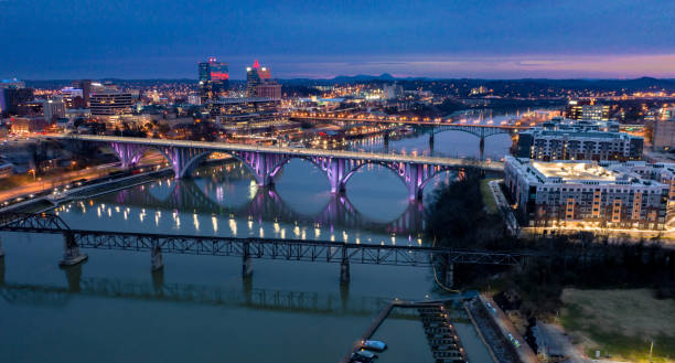 Downtown Knoxville Before Sunrise A pre-dawn shot of Downtown Knoxville over the Tennessee River. tennessee stock pictures, royalty-free photos & images