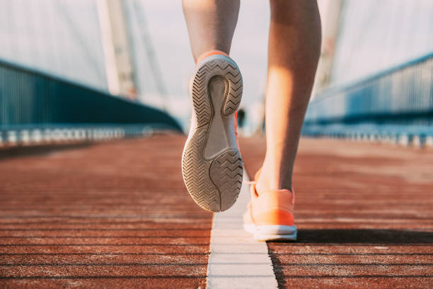 istock crop woman running on the bridge 1126430628