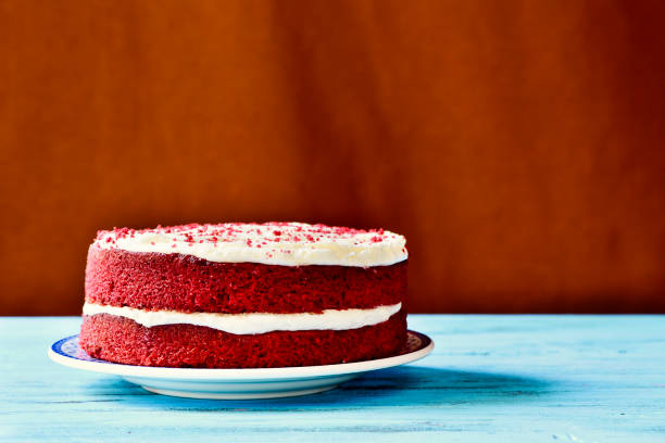 red velvet cake on a blue wooden table