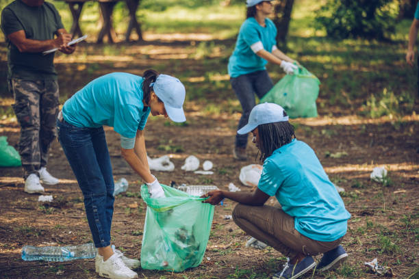 istock Volunteers cleaning nature together 1126434904