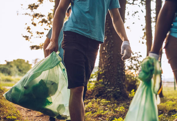 istock Volunteers holding garbage bags 1126438123