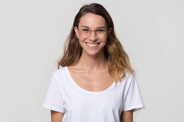 istock Happy woman wearing glasses for vision correction looking at camera 1126440397