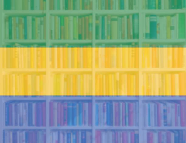 istock Gabon flag with full book shelves background 1126445654