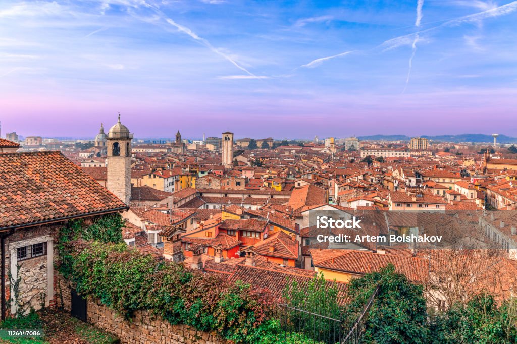 View at sunset on the roofs of the old town of Brescia. Lombardy, Italy Lombardy Stock Photo