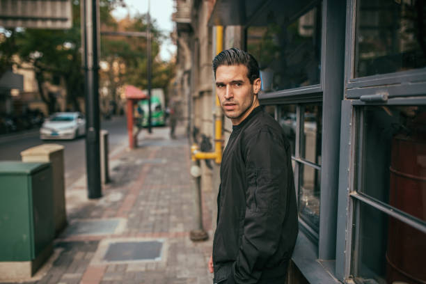 istock Handsome man in black clothing 1126449072