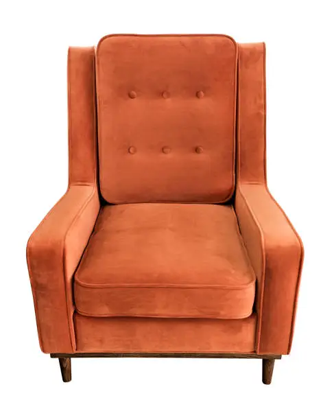 Photo of Orange classical vintage style armchair with velour upholstery isolated on white background. Soft velour fabric chair