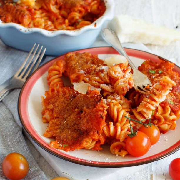 Baked pasta with tomato sauce and mozzarella cheese