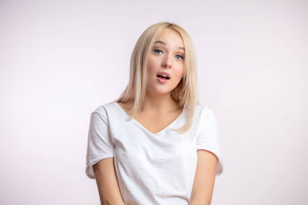 A beautiful blond haired woman with open mouth