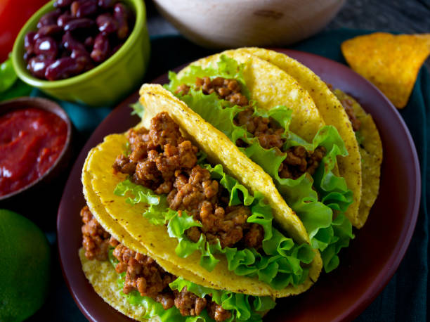 istock plate of tacos, nachos and tomato dip 1126451209