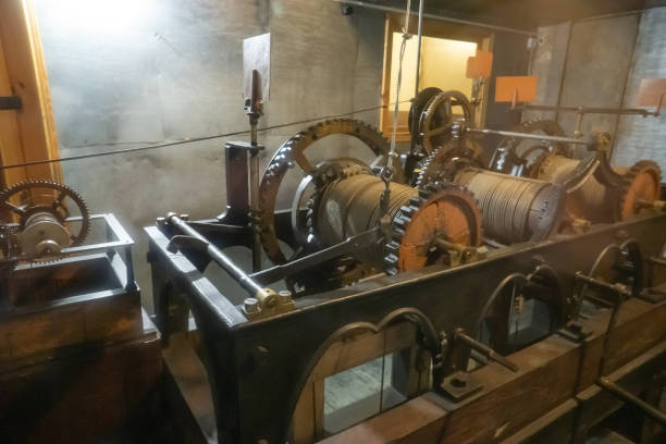 istock Mechanism of the old clock tower inside 1126452266