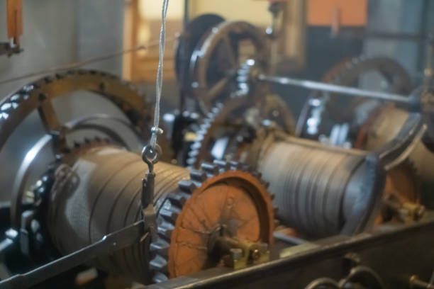 istock Mechanism of the old clock tower inside 1126452314