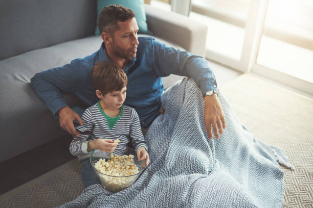 istock What do you want to watch son? 1126452650