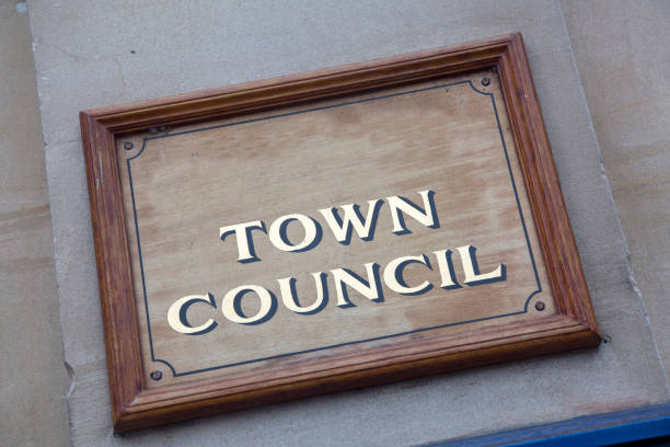 istock Town Council Sign on Building 1126456280