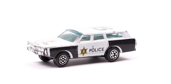 Metal toy car, police, isolated on white